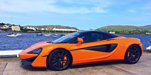 McLaren 720s Car parked by the sea on a Waynes World Of Wheels Drive