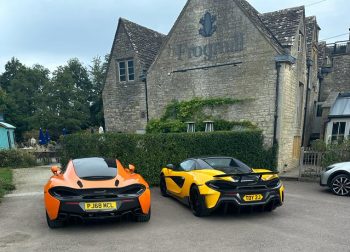 Two Mclaren Supercars parked in front Of Frogmill Hotel in The Cotswolds on a WWOW supercar scenic stay