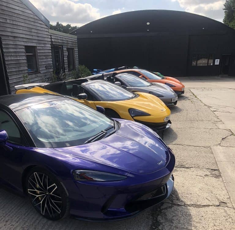 A line of Mclaren Supercars parked at the classic Car Hub in The Cotswolds as part of the WWOW Cotswolds Canter supercar drive