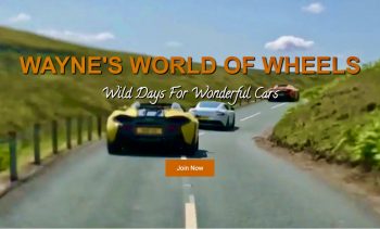 two McLaren Supercars and a Porsche driving along the country roads in Northumberland while on a WWOW Supercar club driving tour