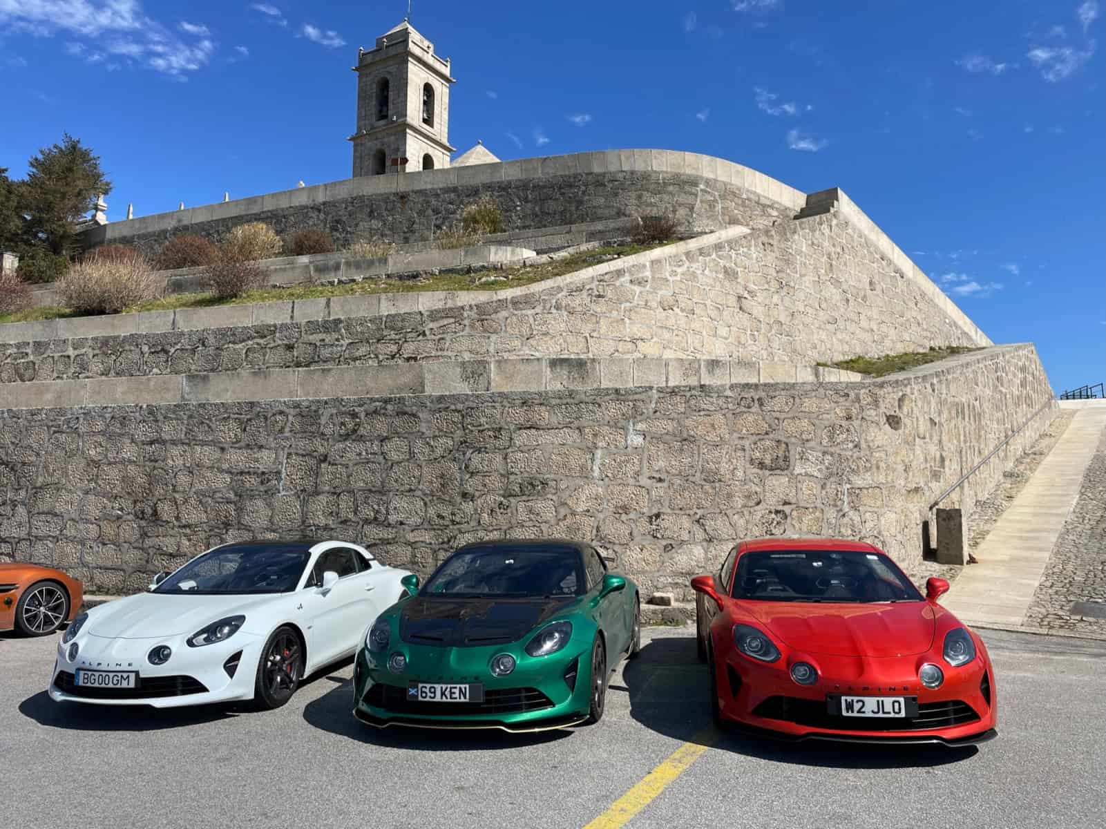 three Alpine cars parked together in the Hills Of Portugal on the WWOW Supercar Adventure to Spain And Portugal