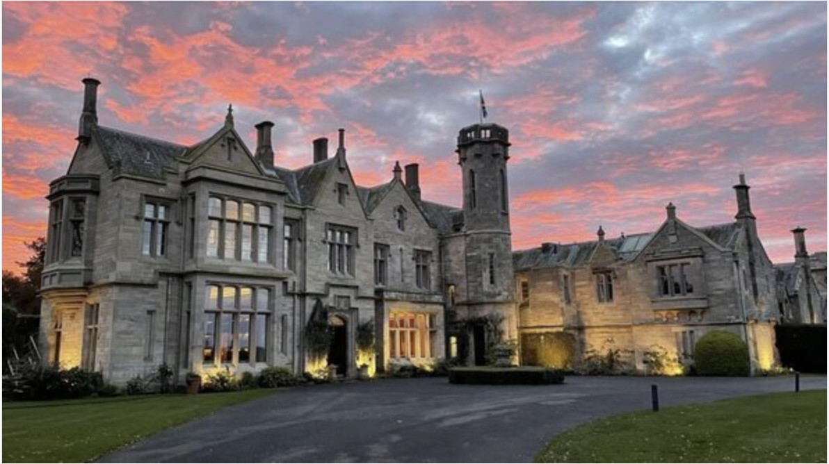 Photo of the Schloss Hotel in Newcastle at sunset location of the Waynes World Of Wheels Grand Castle tour