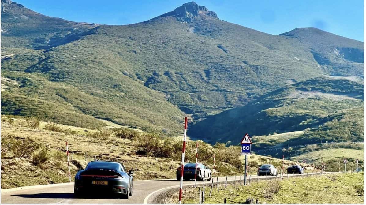 supercars driving through the Douro Valley of Portugal while on the WWOW Portugal Grand Atlantic Tour